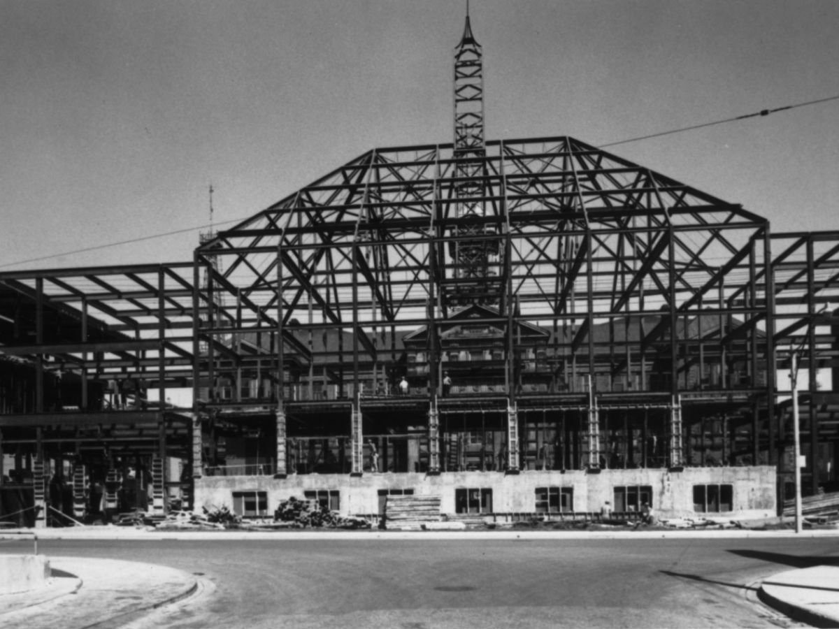 A black and white historical photo of the construction of Kerr Hall