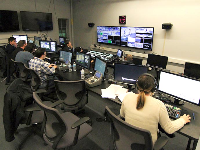 Multi-media studio - people working on computer screens