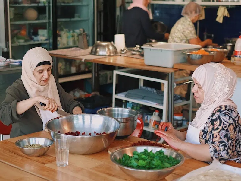 Syrian women cooking together 