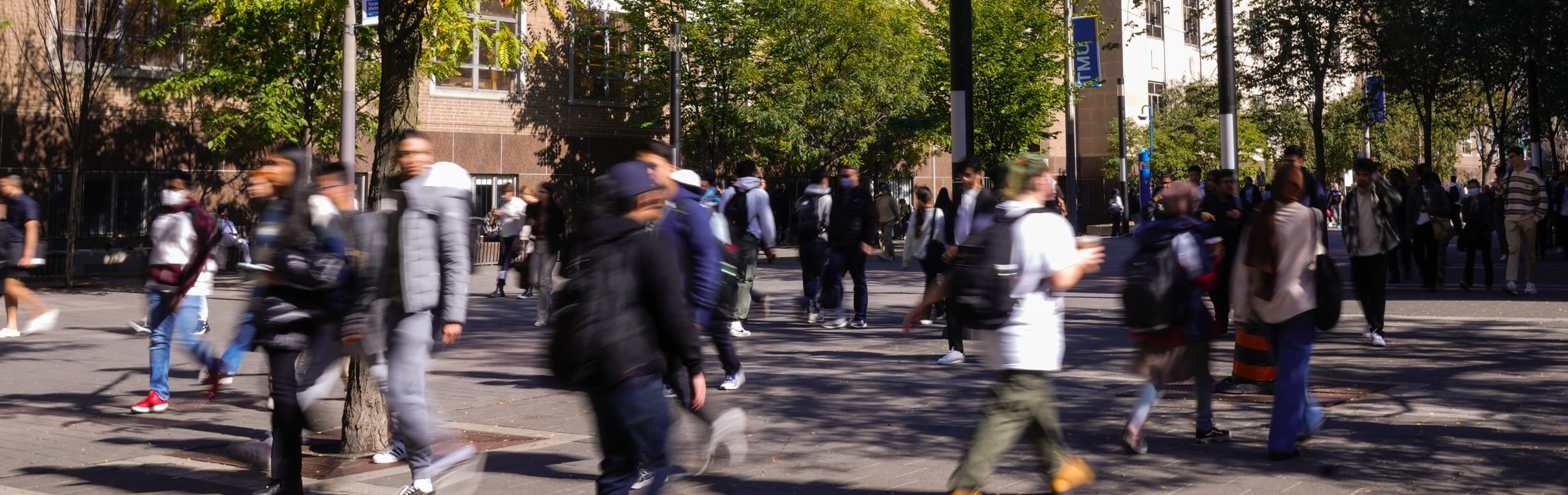 Student walking along Gould St.