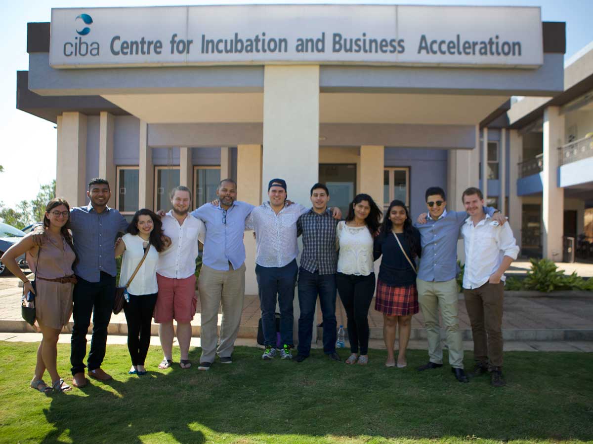 Students standing in front of the Centre for Incubation and Business Acceleration