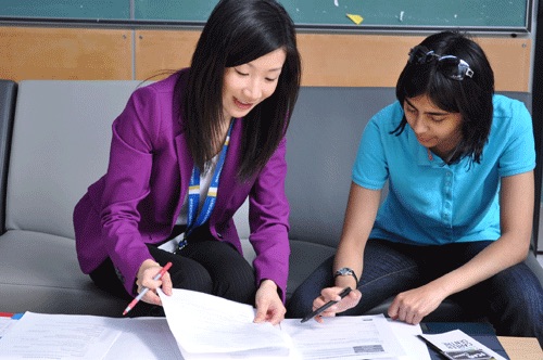 A career consultant working with a student