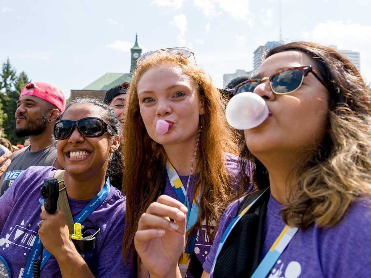 Students blowing bubbles from gum