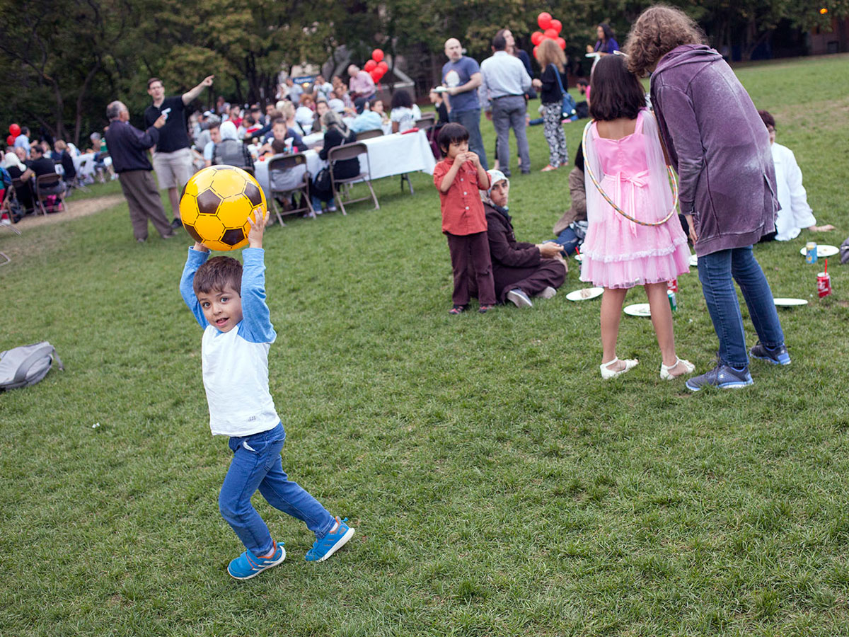A child about to throw a soccer ball