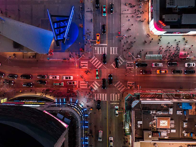 Aerial view of Yonge Dundas square intersection at night.