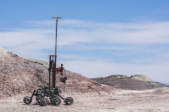 The Ryerson Rams Robotics mars rover in a desert
