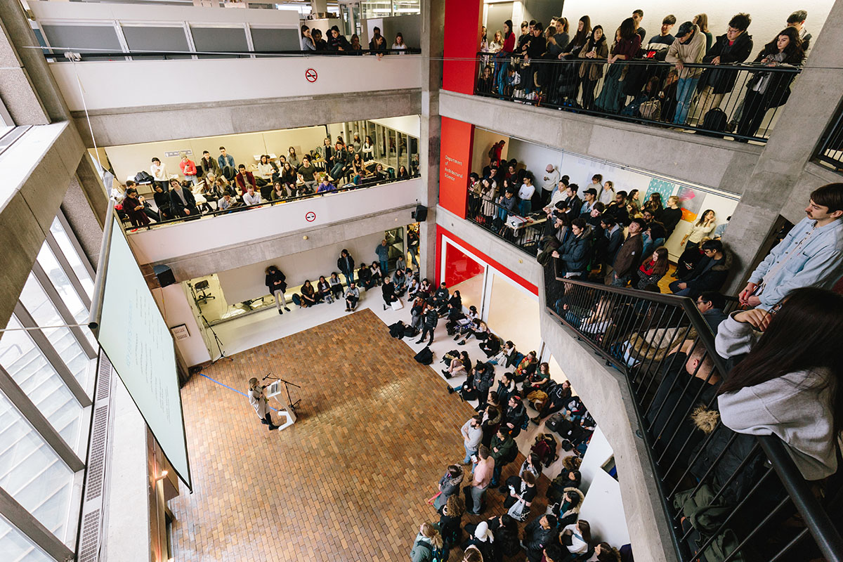 Large group of students in the architecture building foyer