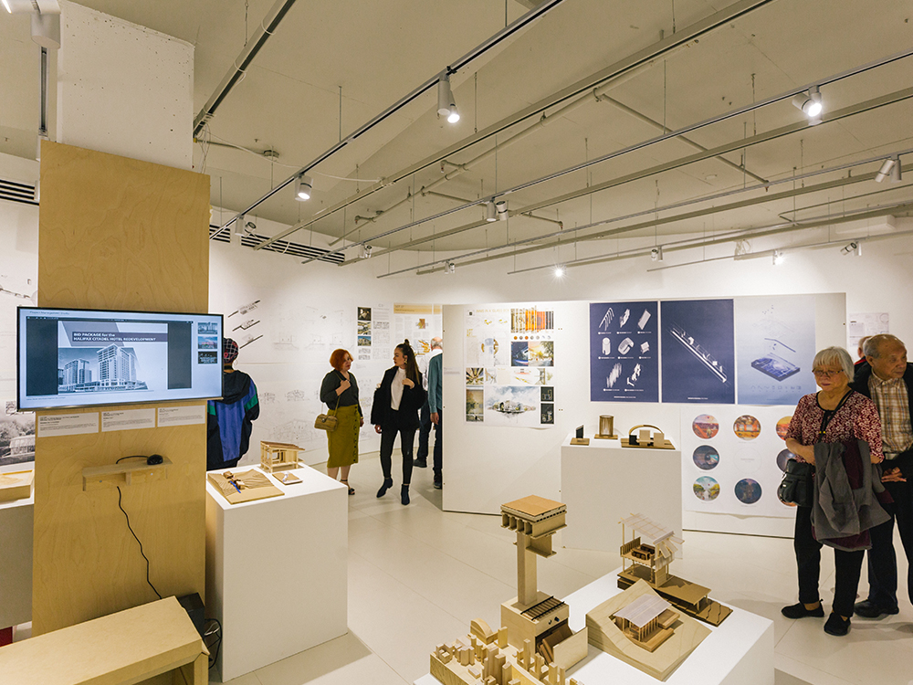 year-end-show-gallery-display-with-visitors