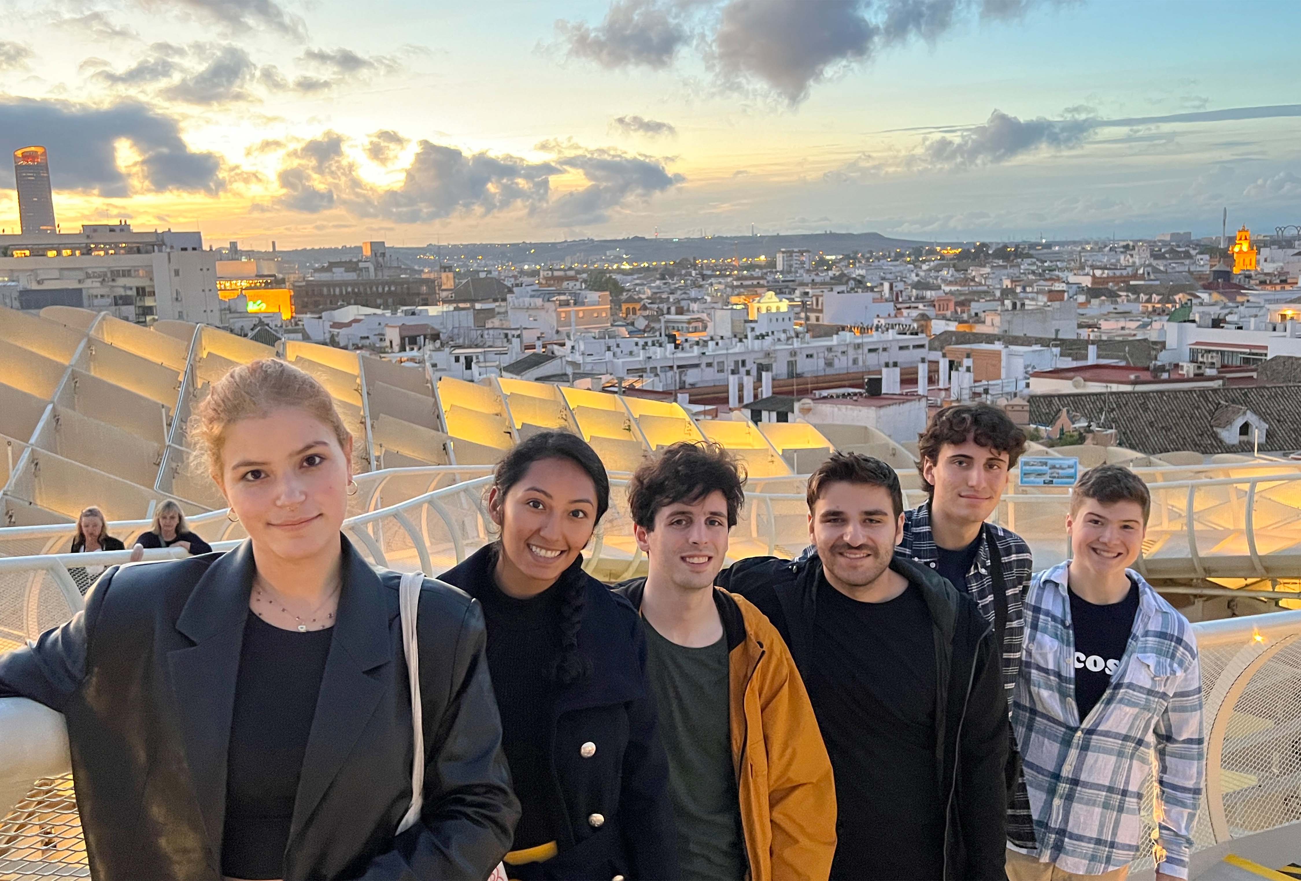 Students Ariel Weiss, Jake Levy, Jake Kroft, Luke De Bartolo, Sadberk Agma, and Daniela Diaz on top of Metropol Parasol in Seville, Spain.