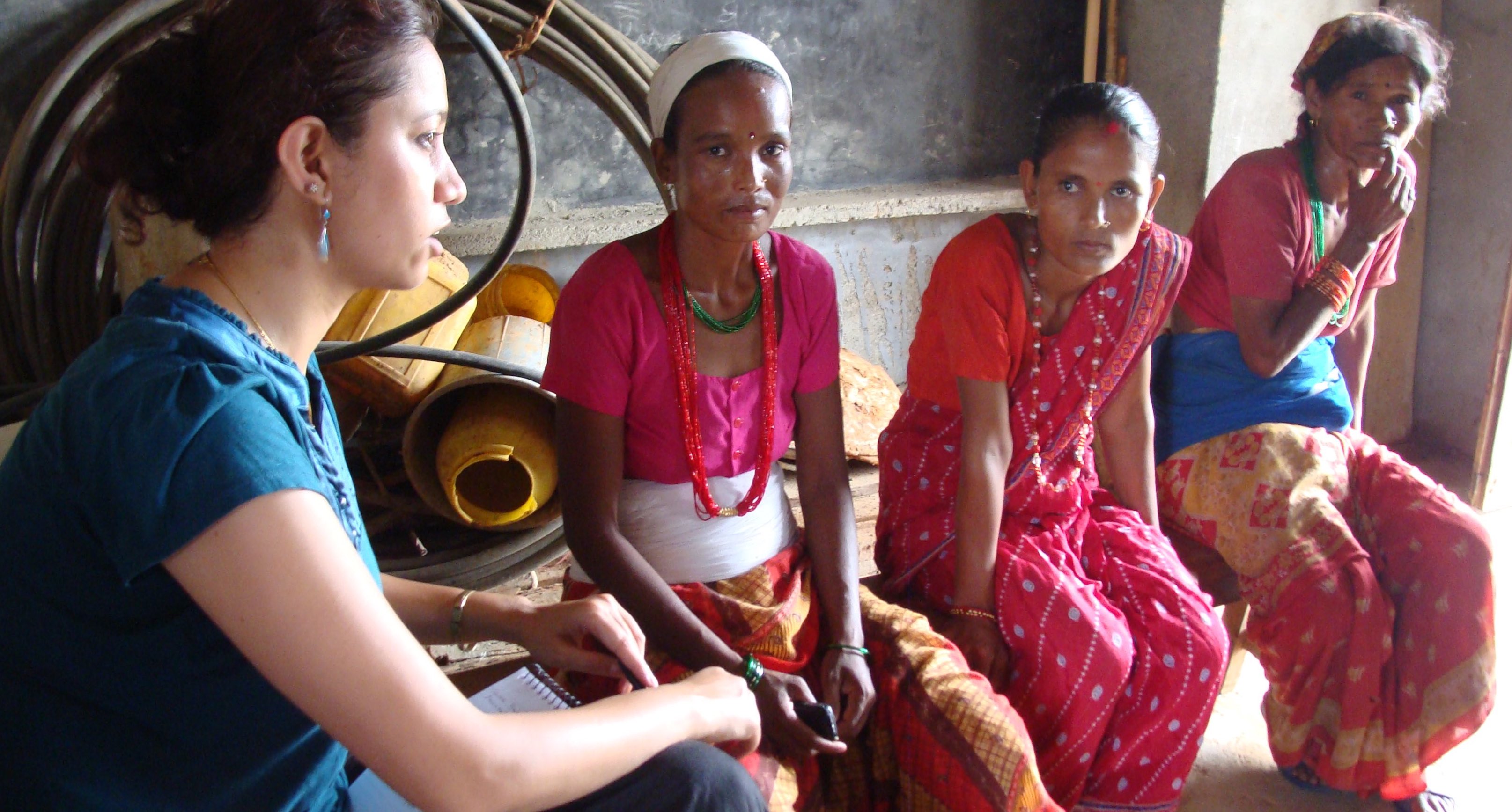 Researcher visiting with Nepalese women