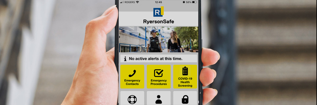 A person holding a cellphone looking at the RyersonSafe app.