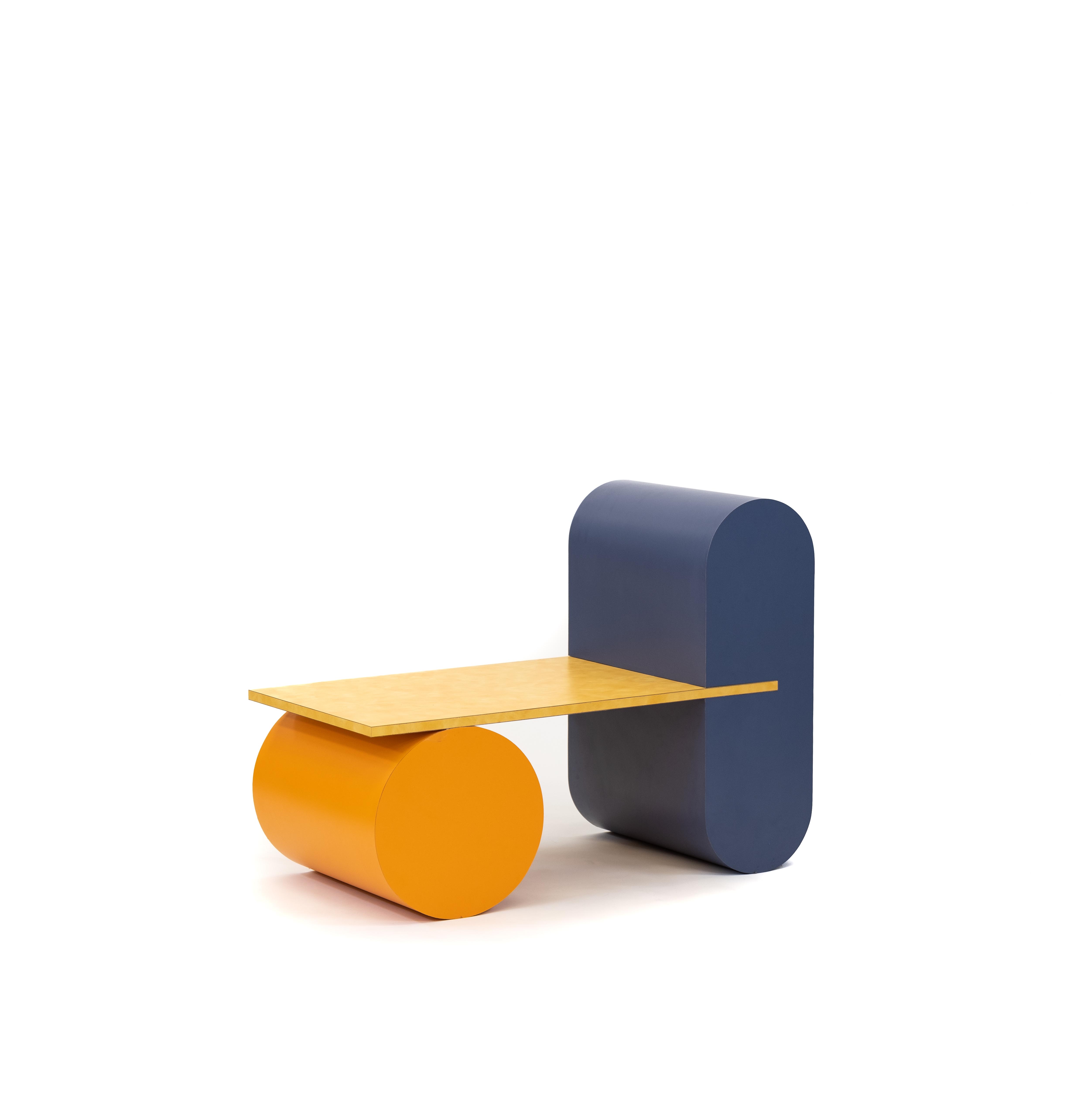 Simple, colourful cylinders are attached by a rectangle, resembling a bench