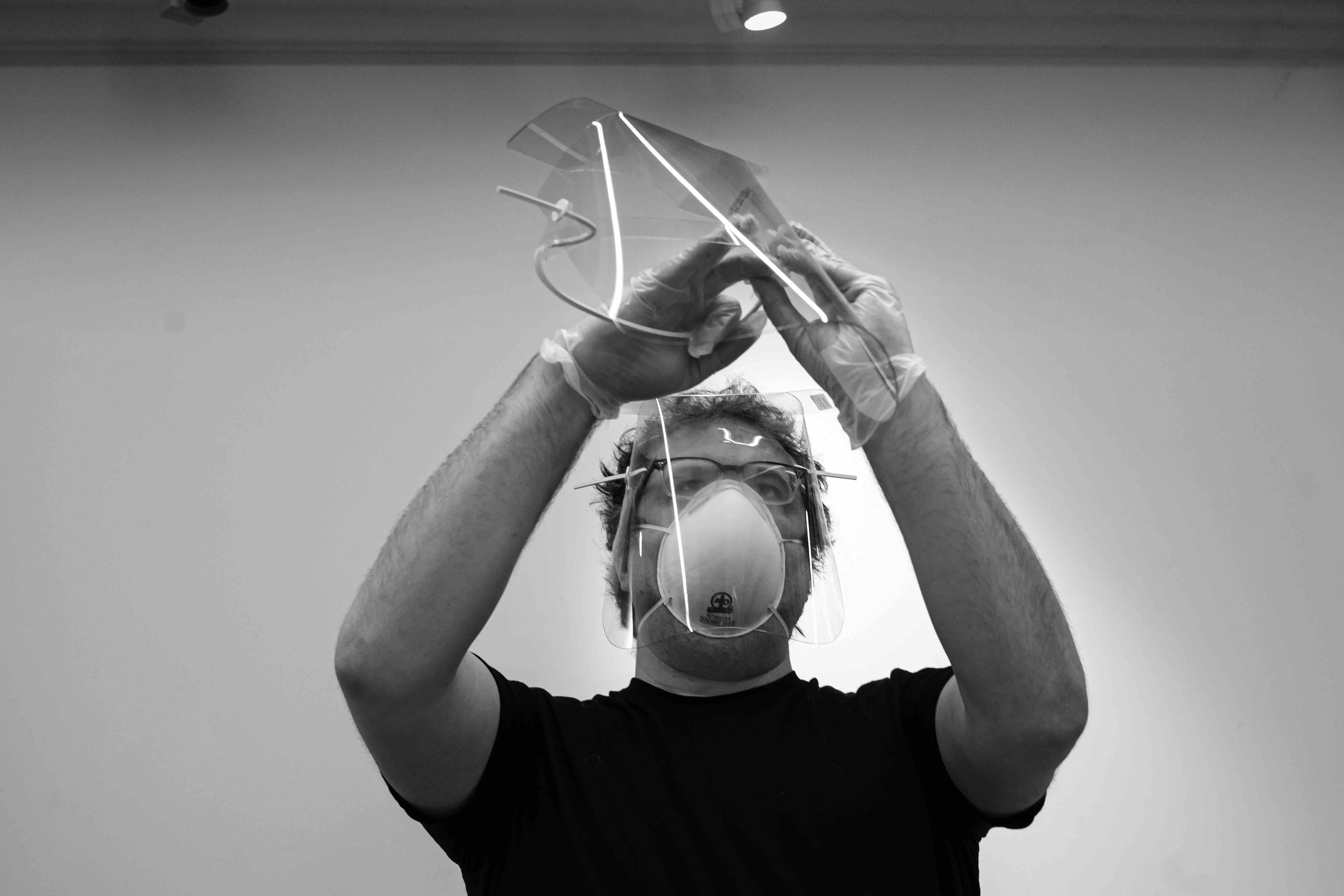 Mark Loeser assembling masks