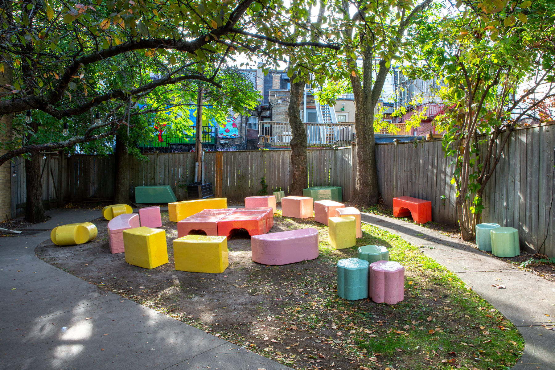 Wide-angle view of about 20 large-scale, colourful blocks from Cecil Community Planting Imagination project.