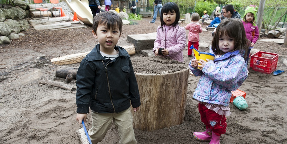 Young children play outside at the Early Learning Centre