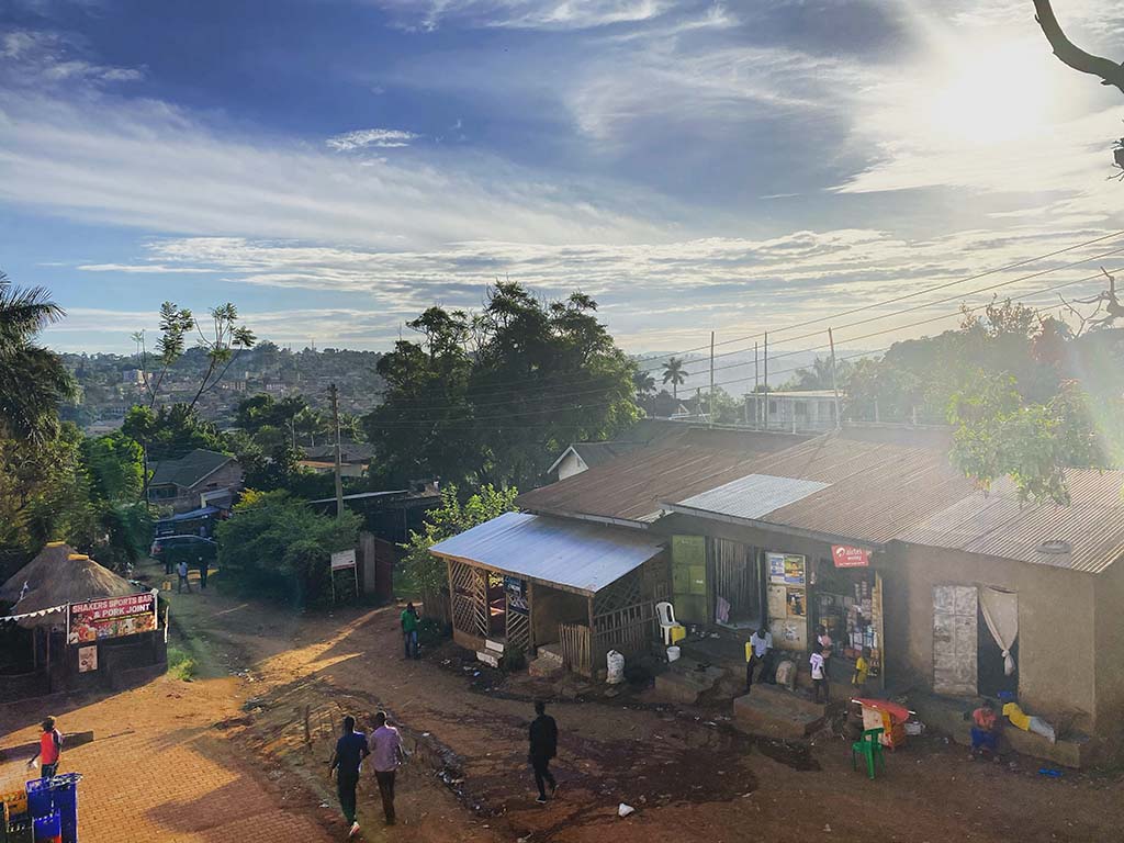A roadside view of an urban refugee settlement in Kampala, Uganda