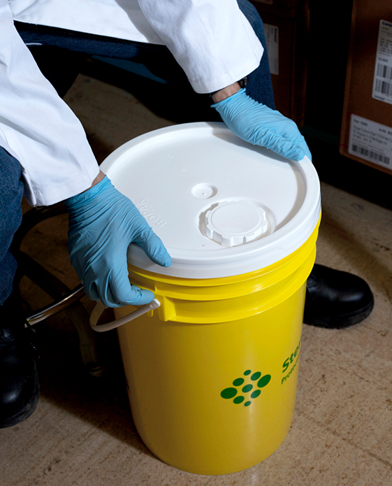 Yellow pail for regular biological waste.
