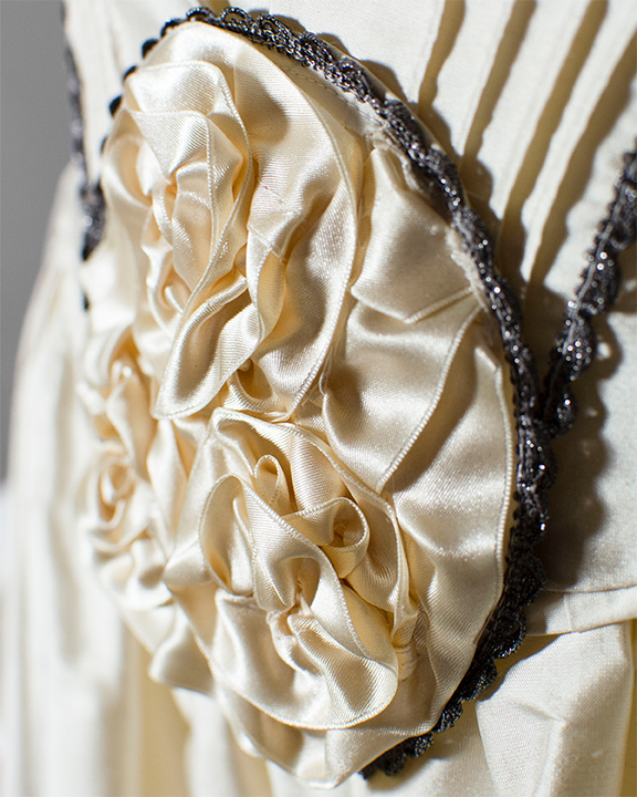 Close up of rosette detail on remake of Wilkie wedding dress