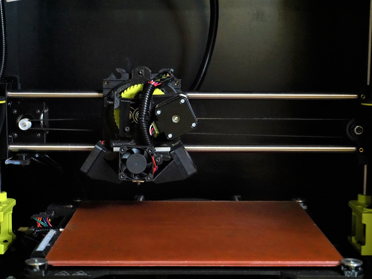 Taz 6 Desktop 3D printer inside an enclosure