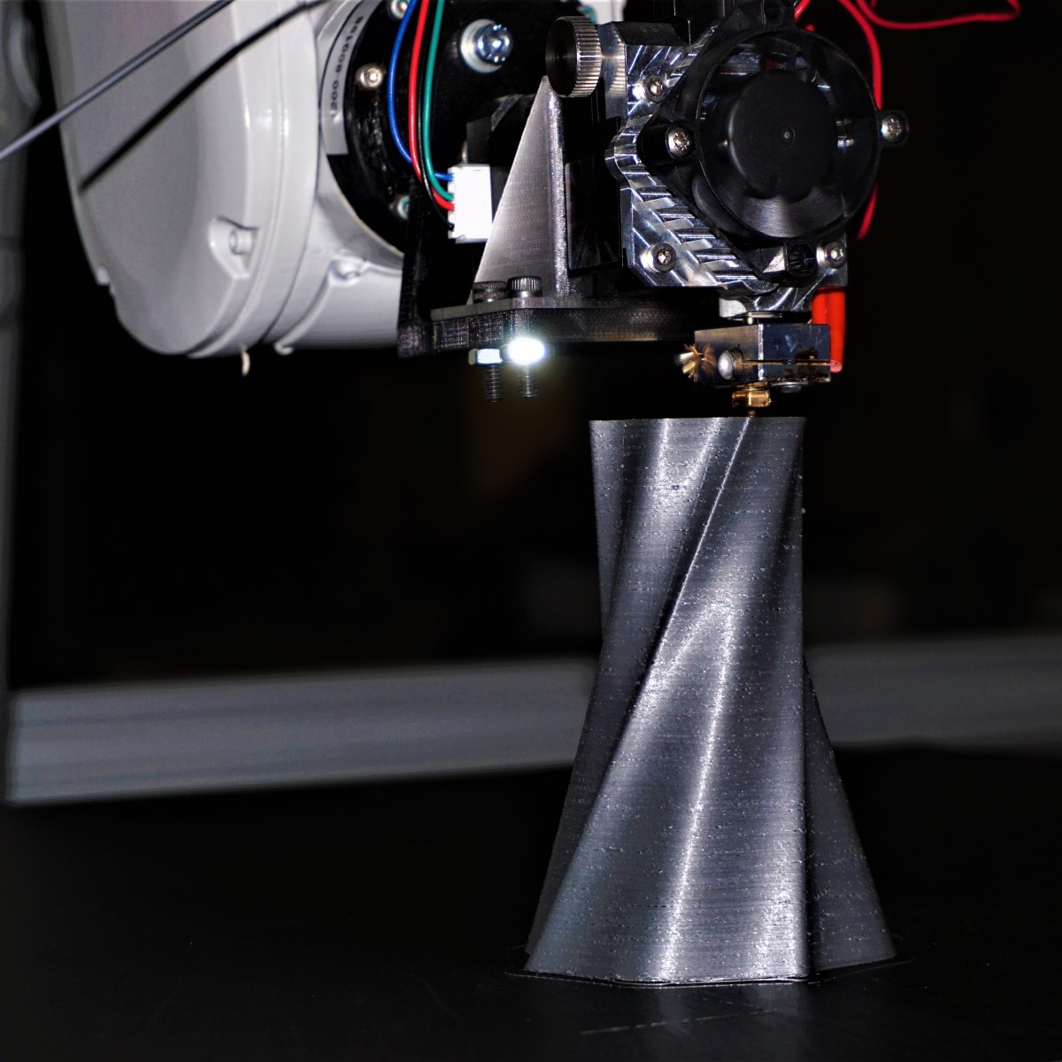 Robotic arm during printing a vase