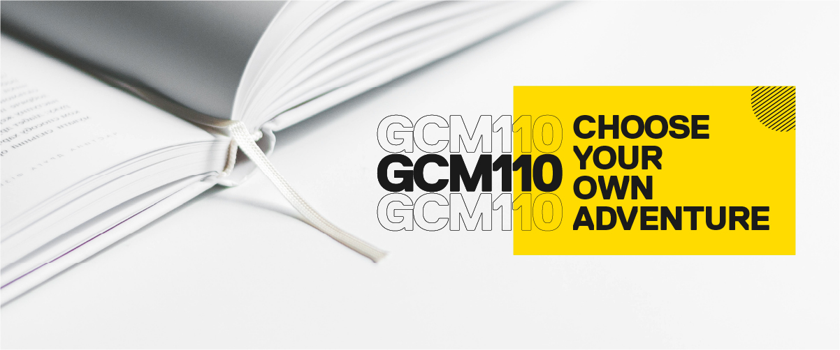 GCM110 - Choose Your Own Adventure. A book open on top of a white table. 