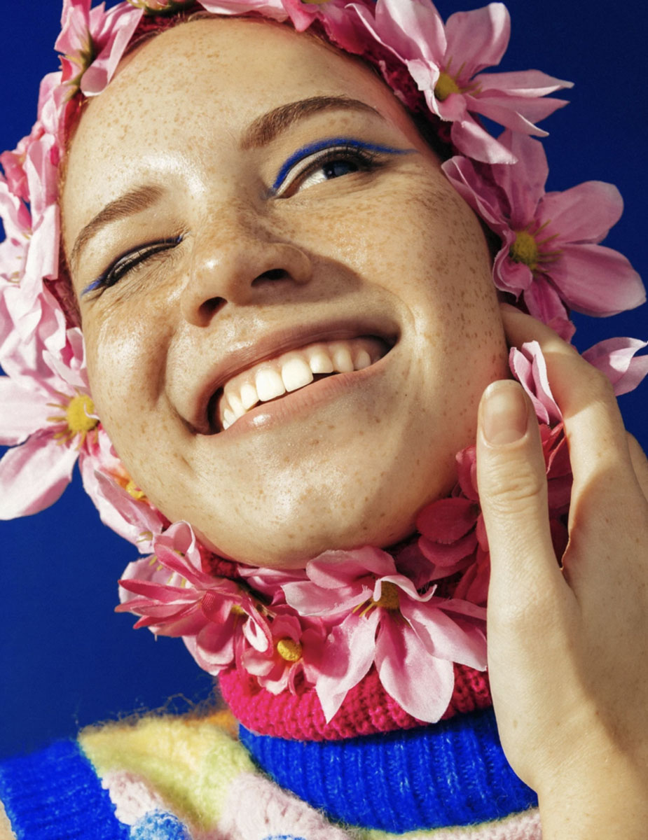 Woman wearing flower headdress, example of student photography