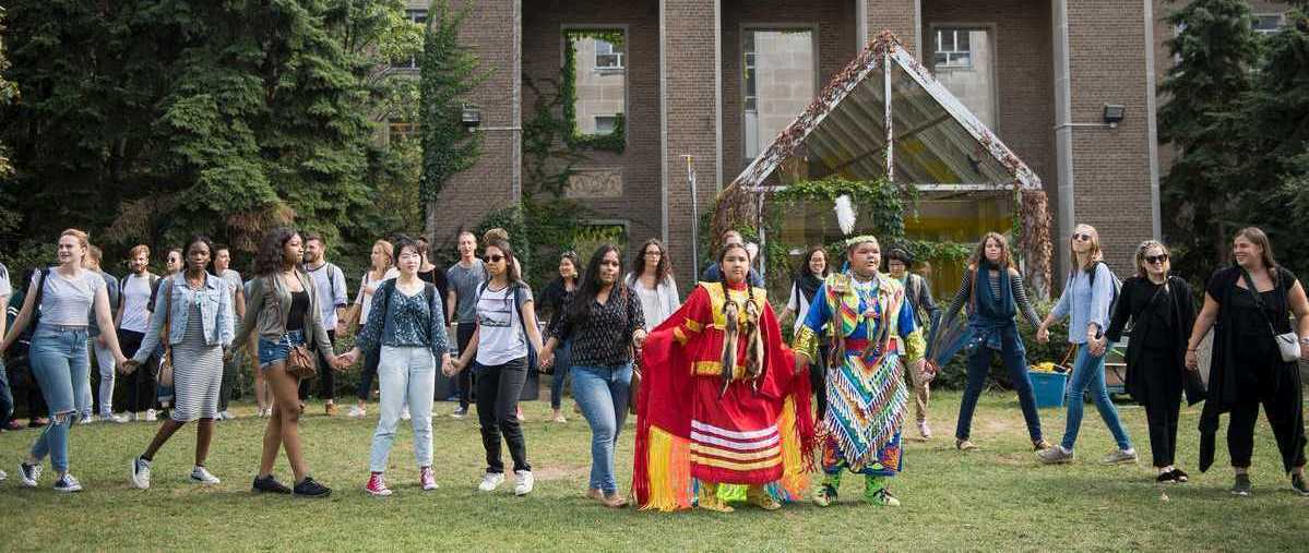 Indigenous and non-Indigenous TMU student at the Quad for the TMU Pow Wow.