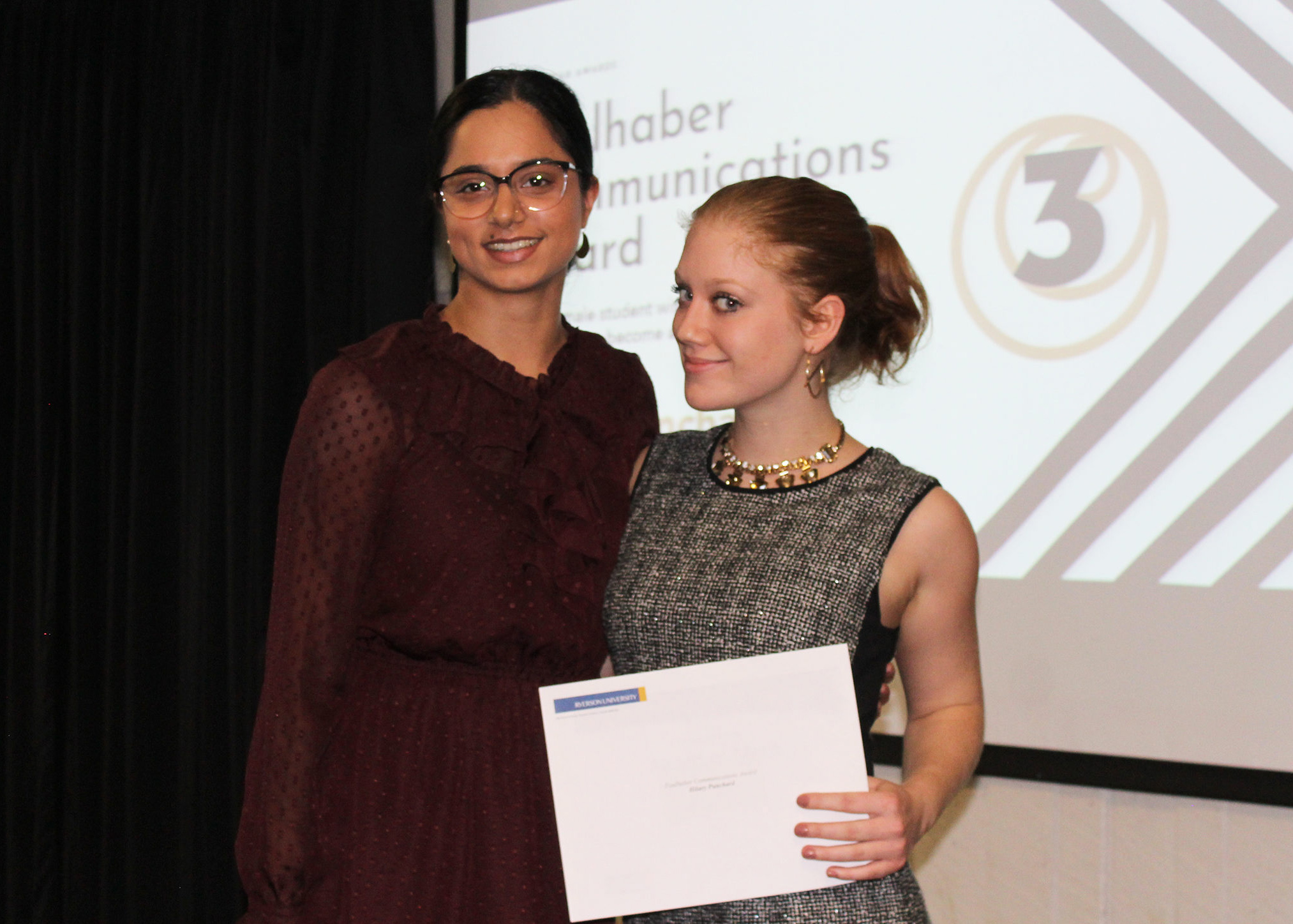 Faulhaber Communications Award presenter Zeba Desantas with award recipient Hilary Punchard.