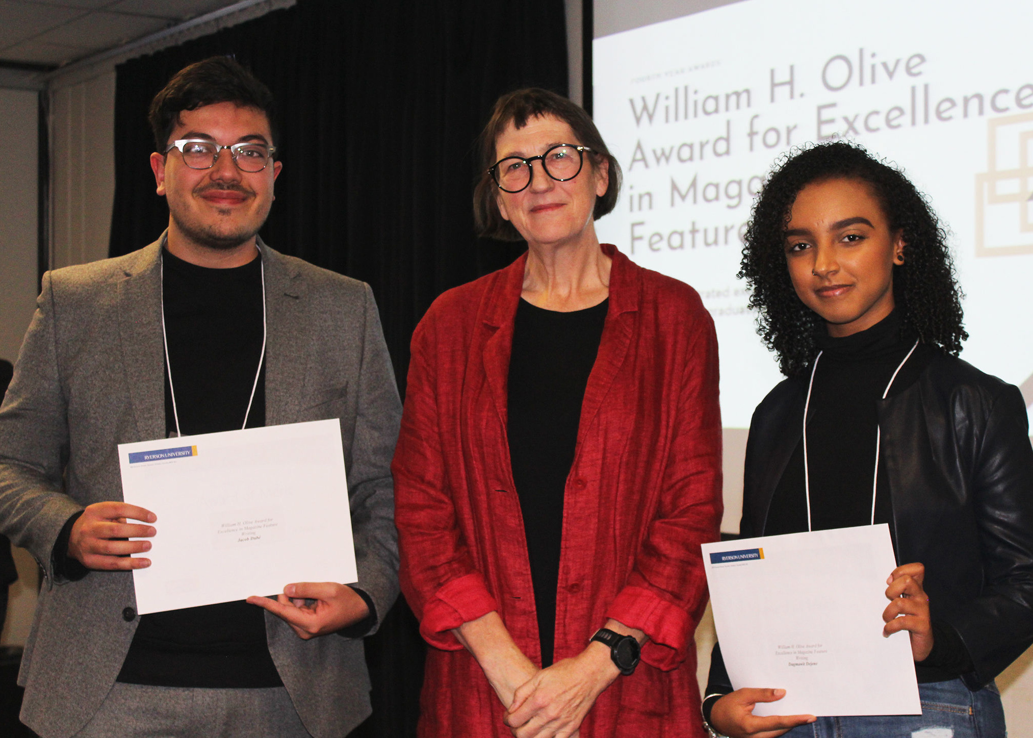 William H. Olive Award for Excellence in Magazine Feature Writing recipient Jacob Dube (l) and Dagmawit Dejene (r) with Awards Committee Chair Jagg Carr-Locke.