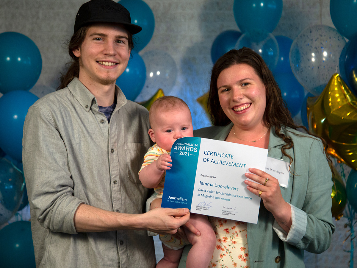 2021 David Tafler Scholarship for Excellence in Magazine Journalism winner Jemma Dooreleyers. with her partner and baby.