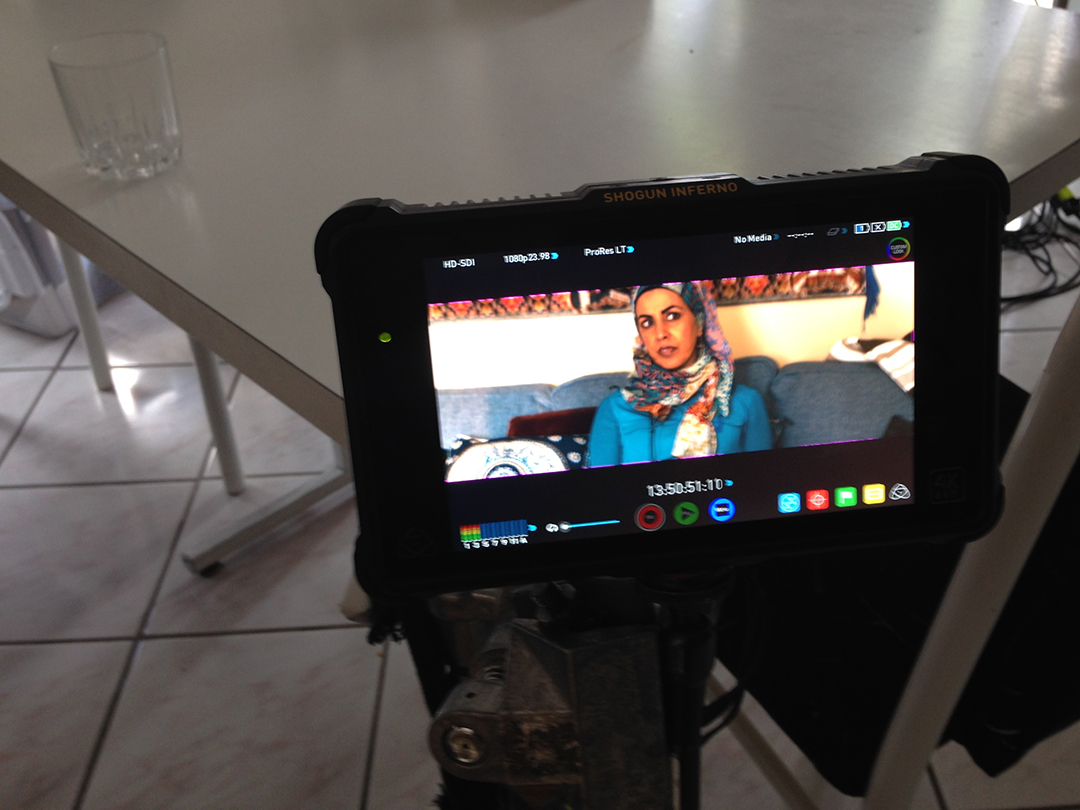 Zarqa Trailer Shoot image with Zarqa Nawaz on the monitor during shooting.