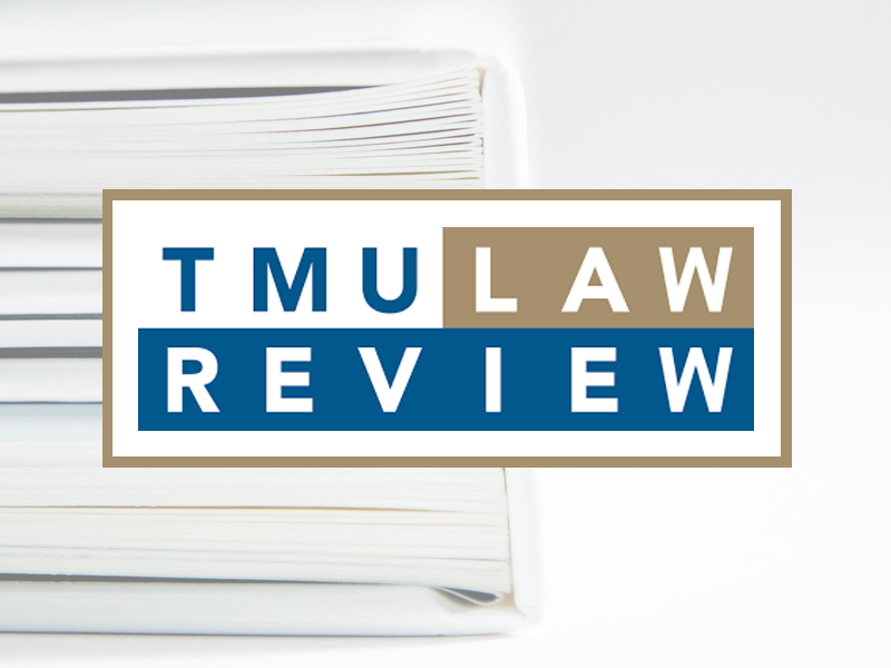 Pile of books with the overlaying text "TMU Law Review".