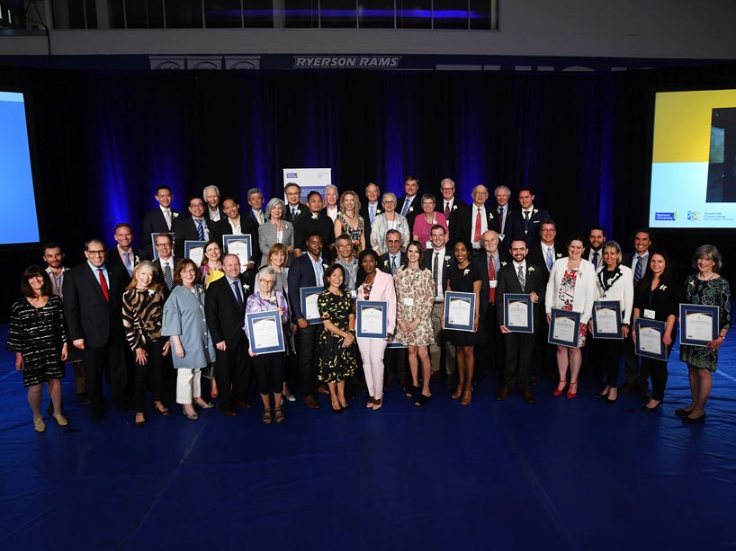 Many of the 61 recipients of the 2018 G. Raymond Chang Outstanding Volunteer Awards