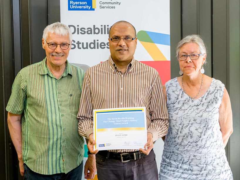Zully Samji (with David Reville and Joyce Brown, executive director of Working for Change) is this year’s recipient of the School of Disability Studies’ David Reville/Working for Change Mad People’s History Course Award. Photo by Clifton Li