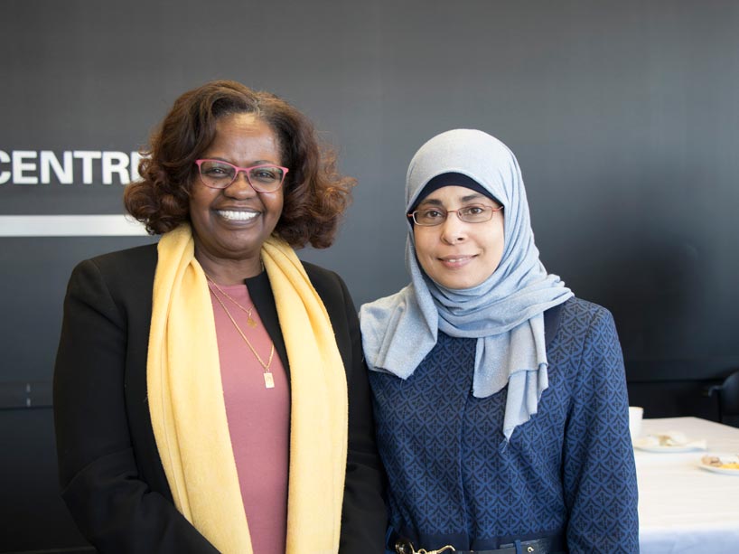 From left: Sarah Bukhari and a community member at the network’s launch