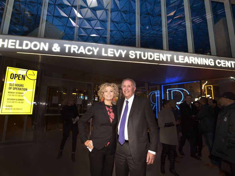 Former Ryerson president Sheldon Levy, right, and his wife Tracy standing in front of the SLC