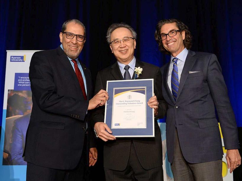 Patrick Cheung, centre, holding award presented by Mohamed Lachemi, left, and Ian Mishkel, right