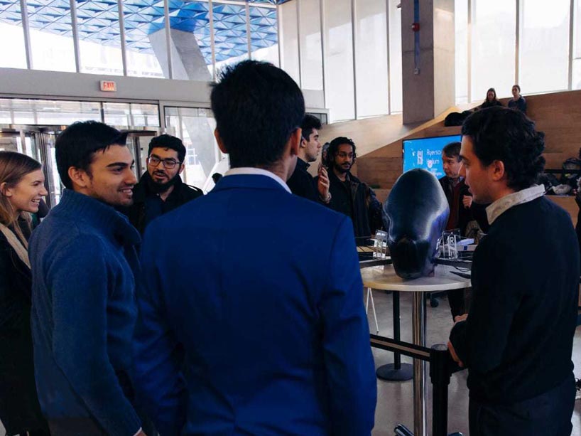 Ryerson Helium team talking to public at an event in the SLC about their small-scale model
