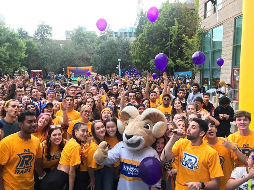 A group of students in Ryerson gear gathered together
