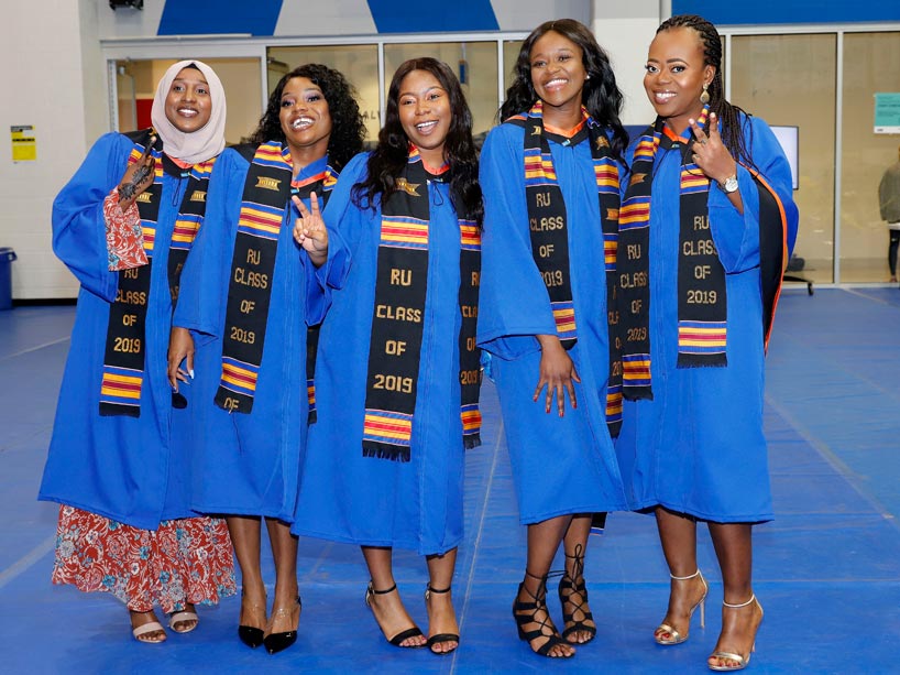 A group of female graduates wearing Kente stoles at Ryerson’s spring 2019 convocation ceremony