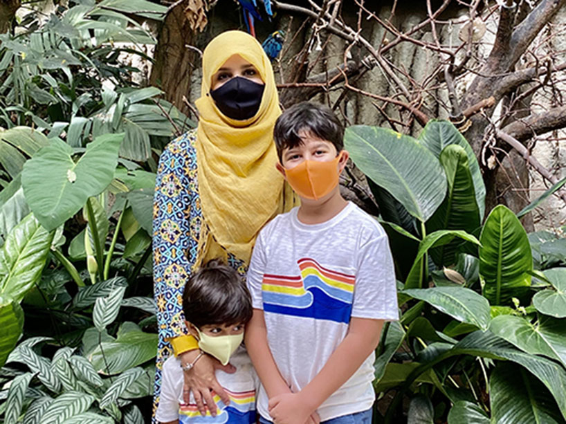 PhD student and full-time mother Zahra Yazdizeh with her two young children