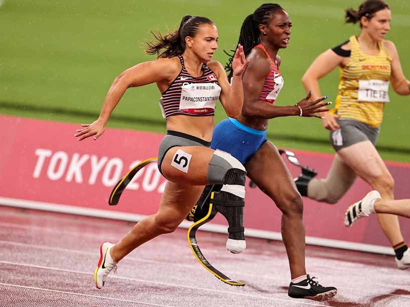 Marissa Papaconstantinou sprints in a close race with other competitors in the 100m semi-final event in Tokyo.