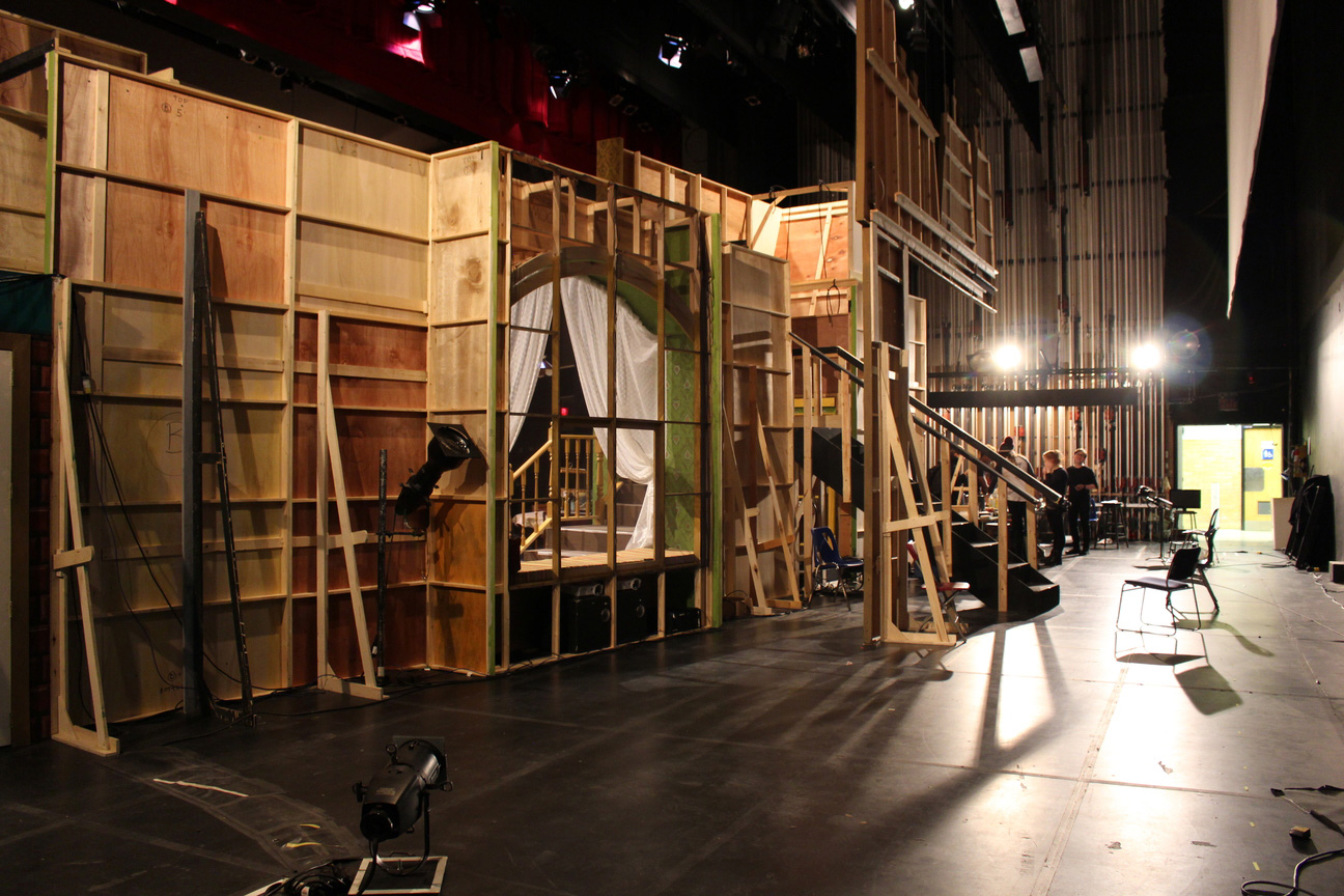 backstage, behind an elaborate stage set