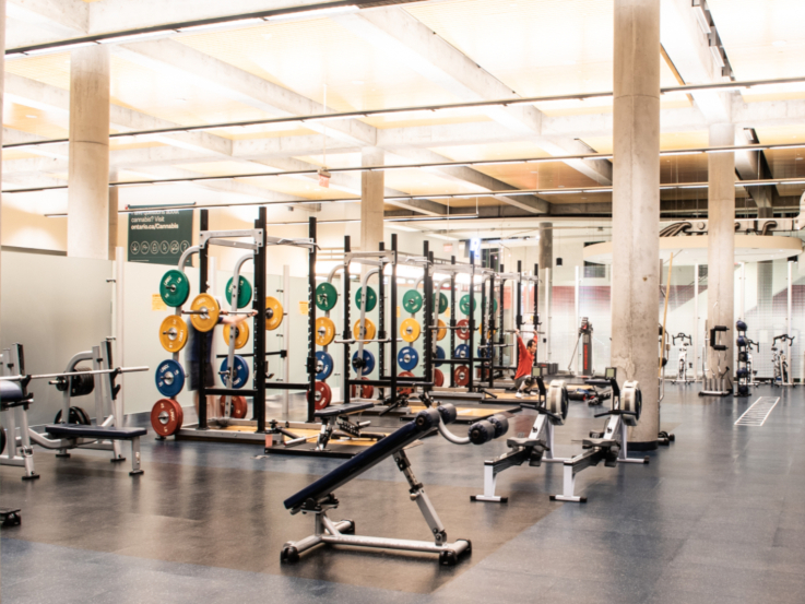 Olympic weightlifting platforms and other equipment in the MAC Fitness Center.