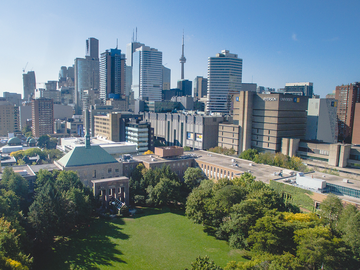 The Ryerson quad during summer with the Toronto skyline in the background