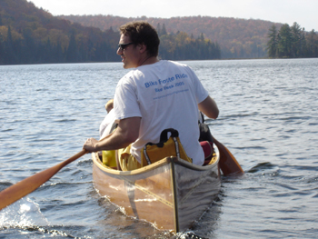 Paddling in his Beloved Hand-made Cedar Strip Canoe