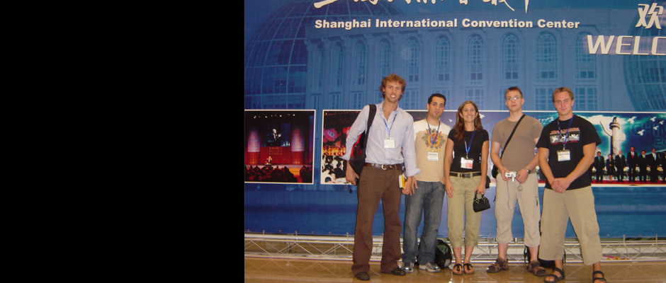 A main slideshow photo of SAR members at a conference in Shanghai