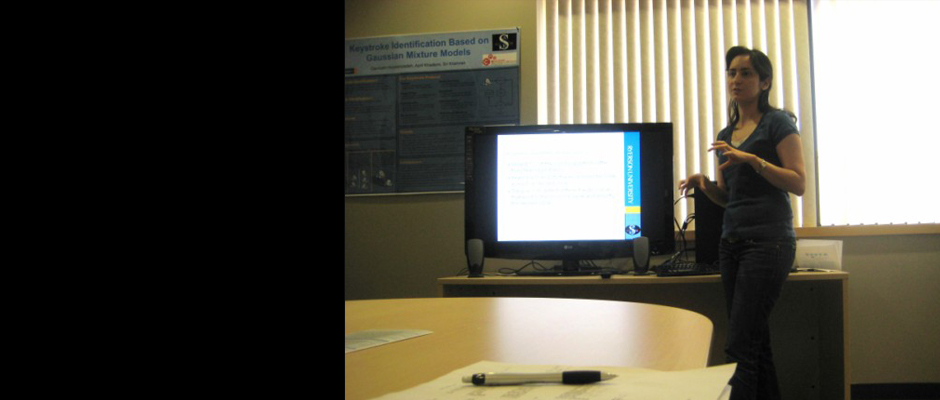 A main slideshow photo of a SAR member presenting in a room