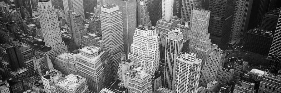 a black and white arial view of a city
