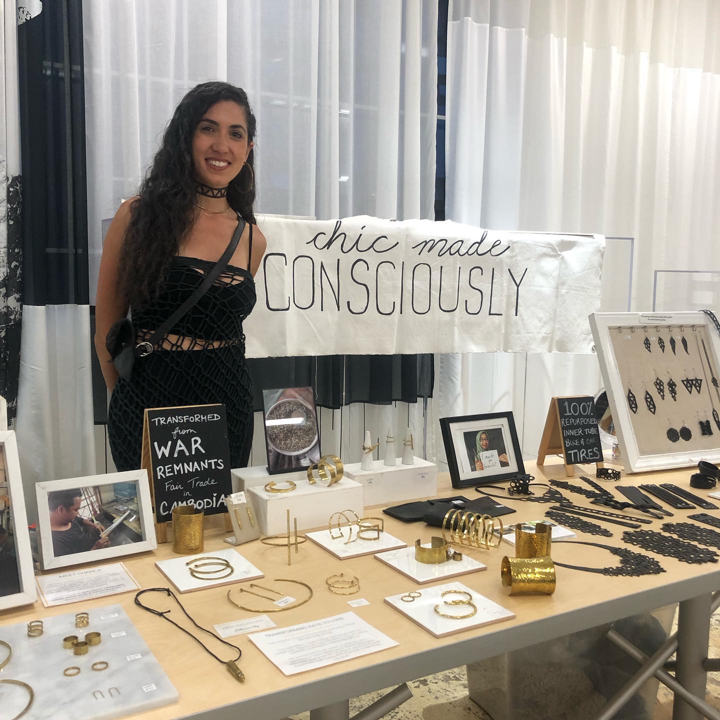 Founder Cassandra Ciarallo at a booth of Chic Made Consciously's products.